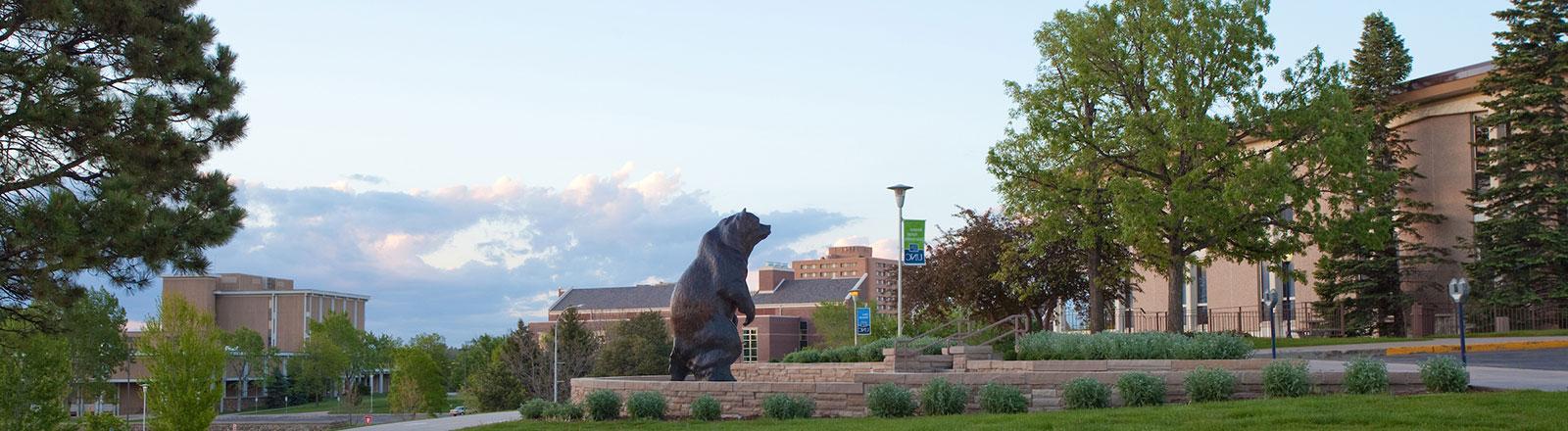 Bear statue outside of University Center on UNC's campus